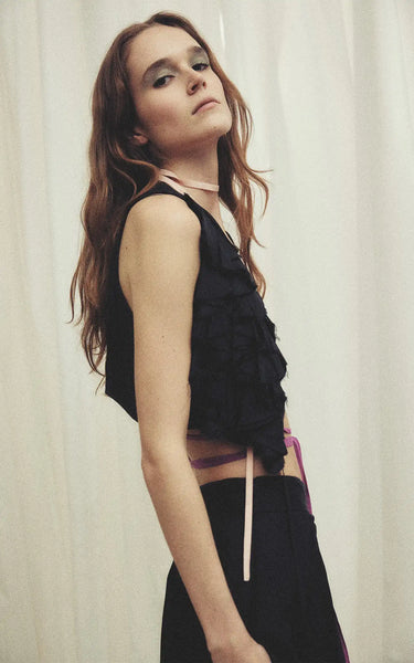 the poetry of her vest